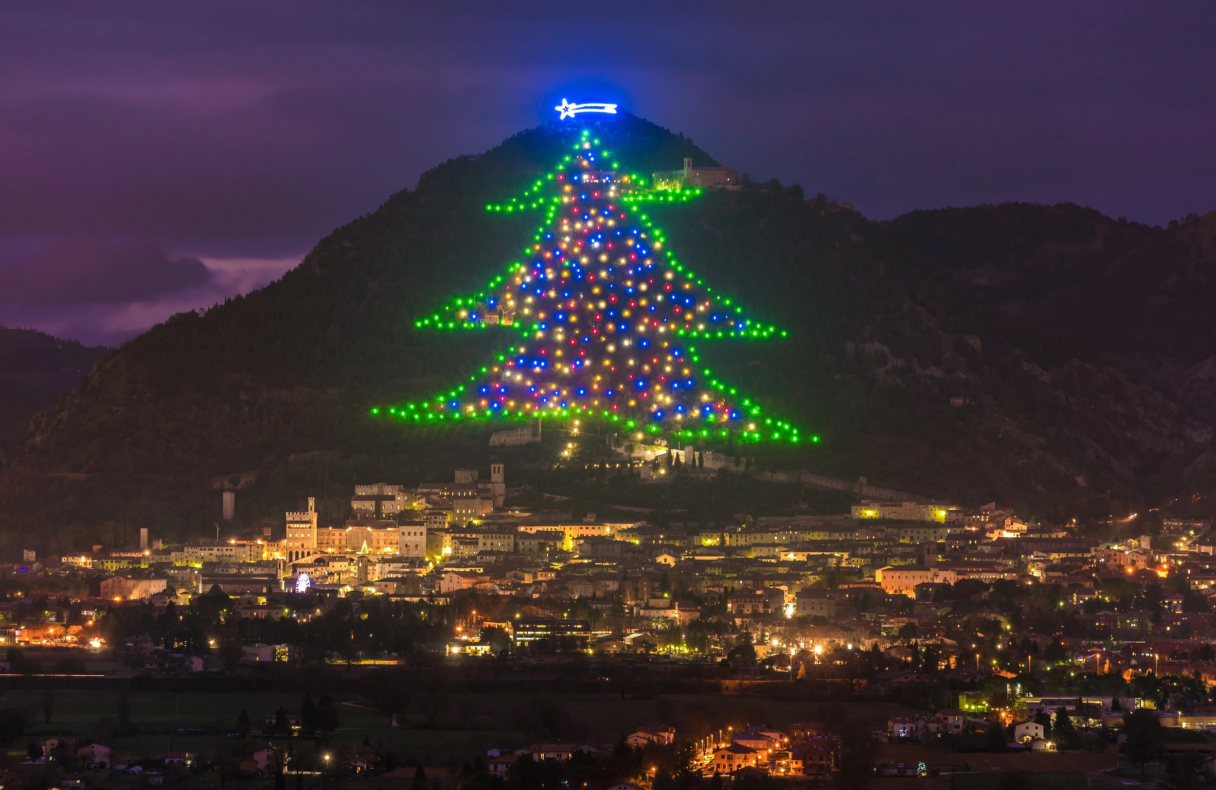 Gubbio Christmas Tree near Lake Trasimeno in the Umbria region of Italy. Very large Christmas tree made up of lights on the side of a hill