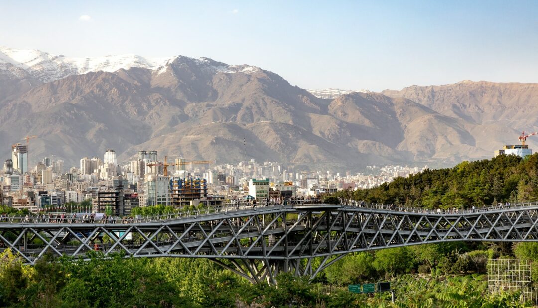 city in Iran with mountains in the background