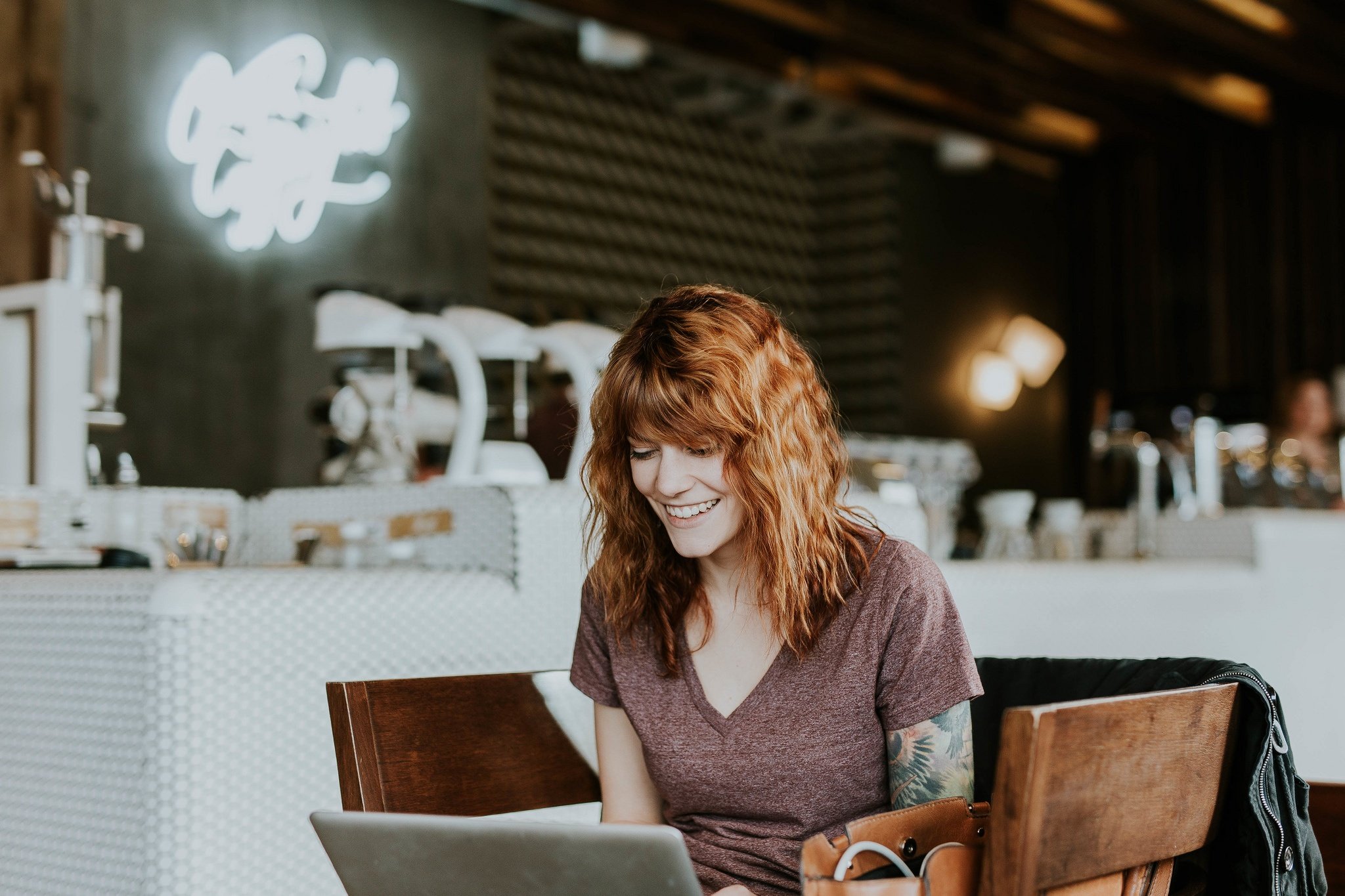 Woman working from coffee shop