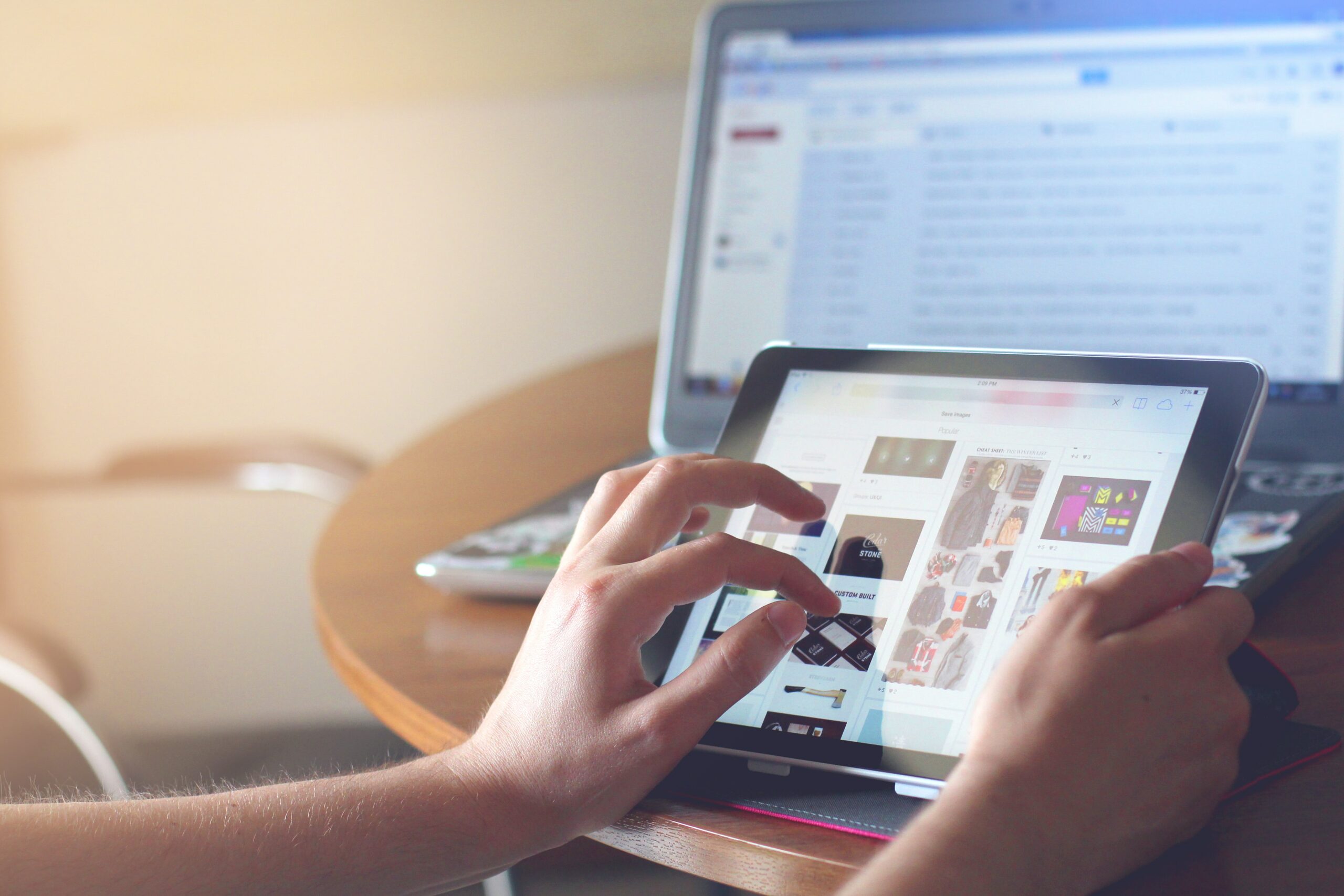 Website UX Across Languages and Cultures. Person on Ipad