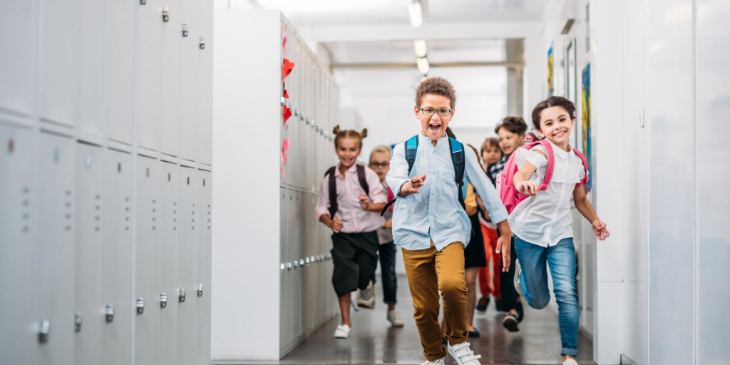 kids running in a hallway