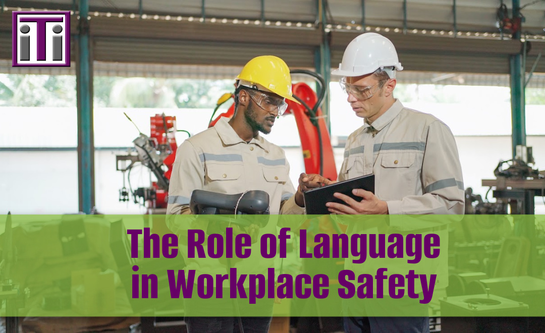 Two men in a factory setting reading a safety manual translation